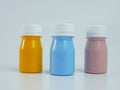 pigment resin paint in the bottle, many colors have pink, blue, and orange