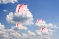 Pigs-coin boxes sit on white clouds Royalty Free Stock Photo