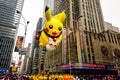 Pikachu Pokemon balloon floats in the air during the Macy`s Thanksgiving Day parade along Avenue of Americas Royalty Free Stock Photo