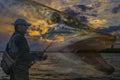 Pike fishing. Photo collage of angler with spinning rod on soft focus muskie fish on cloudy sunset background