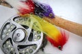 Pike Fly Fishing flies, rod and reel in the snow