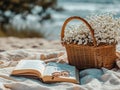 Piknik basket, book and glasses on blanket under umbrella on beach sand