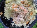 pilaf in a cauldron during the daytime in summer. Royalty Free Stock Photo