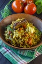 Pilaf on a platter with meat and spices Royalty Free Stock Photo