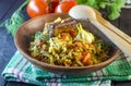 Pilaf on a platter with meat and spices Royalty Free Stock Photo