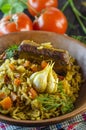 Pilaf on a platter with meat and spices Royalty Free Stock Photo