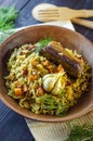 Pilaf on a platter with meat and spices Royalty Free Stock Photo