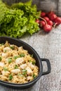 Pilaf rice-curry with chicken and salad in the form of iron Royalty Free Stock Photo