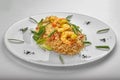 Pilaf with shrimp on a white plate Royalty Free Stock Photo