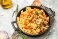 pilaf. Traditional oriental dish of boiled rice, meat, vegetables and spices. Restaurant menu, dieting, cookbook recipe top view Royalty Free Stock Photo