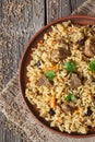 Pilaf traditional spicy asian food with rise, meat