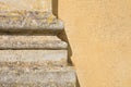 Pilaster strip of an old neoclassic Italian church against a plaster wall