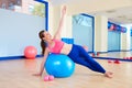 Pilates woman fitball side bend exercise workout Royalty Free Stock Photo