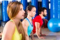 Pilates Yoga training exercise in fitness gym Royalty Free Stock Photo