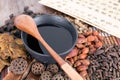 A pile of all kinds of traditional Chinese medicine and prescriptions and a bowl of decocted decoction Royalty Free Stock Photo