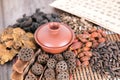 A pile of all kinds of traditional Chinese medicine and prescriptions and a bowl of decocted decoction Royalty Free Stock Photo
