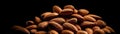 Pile Of Almonds On A Black Background. Generative AI Royalty Free Stock Photo