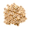 Pile of alphabet letters on wooden scrabble pieces, isolated on white background with clipping path Royalty Free Stock Photo