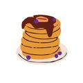 Pile of american pancakes with berries and chocolate toppings. Stack of hotcakes, flapjacks, griddlecakes with syrup