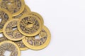 Pile of Ancient Chinese Coins with Square Holes on White Background, Close-Up Royalty Free Stock Photo