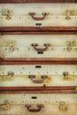 Pile of antique weathered suitcases