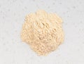 Pile of apple pectin powder close up on gray Royalty Free Stock Photo