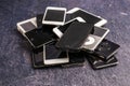 Stack of old iPhones and iPods