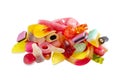 A pile of assorted of chewy jelly fruit candies isolated on a white background