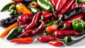 A pile of assorted peppers on a white background