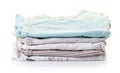 Pile of baby clothes isolated on white Royalty Free Stock Photo