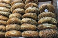 Pile of fresh bagels with seads