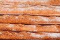 Pile of baguette wheat bread close up details