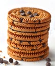 Pile of baked chocolate biscuits with choco chips on white background.AI generated