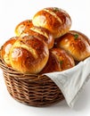 Pile of Baked Golden Brown Bread Rolls in a Wicker Basket Royalty Free Stock Photo