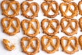 A pile baked pretzels on white.