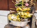 Pile of Balinese offerings made of palm leaves