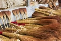 A pile of bamboo brooms in market for sale at Uzbekistan bazaar.