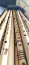 A pile of bamboo flutes, a musical instrument that is sounded by blowing Royalty Free Stock Photo