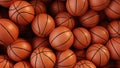 A pile of basketballs are stacked on top of each other