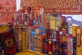 Pile of beautiful handmade carpets on the open market bazaar. Turkish traditional design Royalty Free Stock Photo