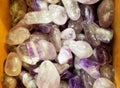 A pile of beautiful purple and white amethyst stones