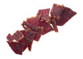 Pile of beef jerky pieces isolated on white background, top view Royalty Free Stock Photo