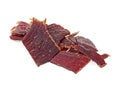 Pile of beef jerky pieces on white background Royalty Free Stock Photo