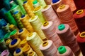 Pile of big colorful spools of thread. Royalty Free Stock Photo