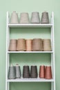 Pile of big colorful spools of yarn on shelving Royalty Free Stock Photo