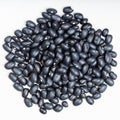 Pile of black mexico beans close up on gray plate