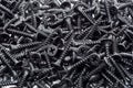 Pile of black wood screws Royalty Free Stock Photo