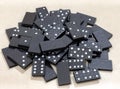 Pile of Black Wooden Domino Pieces Gathered Royalty Free Stock Photo