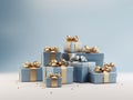 A pile of blue gift boxes with gold bows. Royalty Free Stock Photo