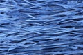 Background - blue paper raffia strips situated in parallel lines